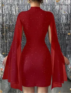 Back view of elegant red ribbed bodycon dress with sheer chiffon cape sleeves.