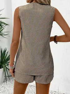 Back view of a chic black and beige striped sleeveless top and matching high-waist shorts set