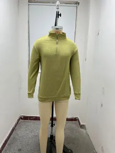 Detailed studio view of an olive green men's quarter-zip sweatshirt on a mannequin