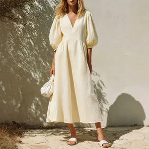 Elegant light yellow V-neck midi dress with puff sleeves and A-line silhouette for summer vacation