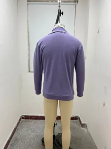 Rear view detail of a purple men's casual long-sleeved sweatshirt with zip collar