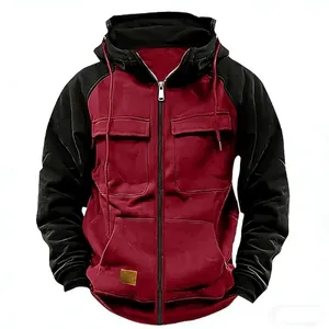 Detail view of men's color block hooded sweatshirt with multi-pocket workwear design.