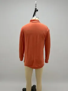 Detailed back view of a men's orange long sleeve woolen polo shirt displayed on a mannequin