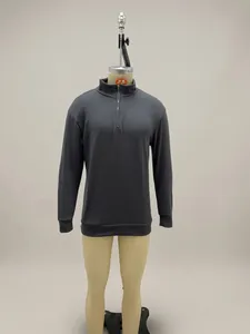 Detailed macro view of a dark grey men's quarter-zip long sleeve casual polo shirt