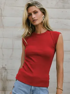 Detail view of a vibrant red sleeveless ribbed knit top featuring a chic crew neck design