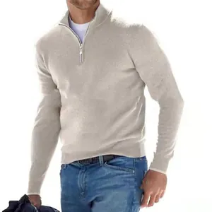 Detailed view of men's fall casual quarter-zip wool sweater in light grey melange texture
