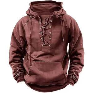 Detailed view of vintage burgundy lace-up hoodie with a front kangaroo pocket design
