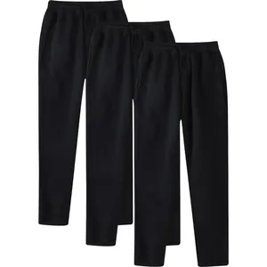 Detail view of three pairs of men's black fleece-lined straight leg sweatpants