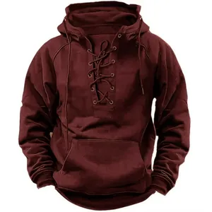 Close-up detail view of a men's burgundy lace-up hoodie with retro American styling