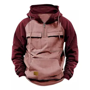 Detailed view of men's vintage color-blocked fleece hoodie featuring half-zip and pockets