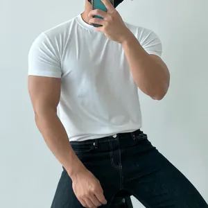 Athletic fit breathable white cotton crew neck t-shirt for men on a muscular model