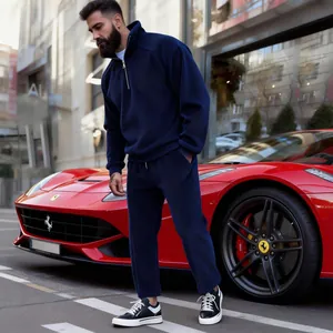 Detail view of men's navy blue corduroy tracksuit with half-zip stand collar
