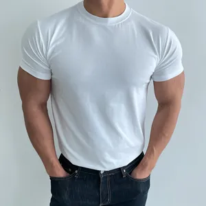 Close-up of a men's athletic slim-fit white cotton T-shirt highlighting physique.