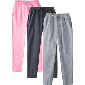 Detail of men's fleece-lined casual sweatpants in pink, charcoal, and light grey
