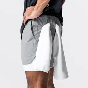 Detailansicht der grauen 2-in-1 Herren-Sporthose mit praktischer Handtuchschlaufe.