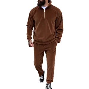 Men's brown corduroy tracksuit set with half-zip stand collar and trendy casual style design