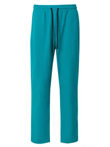 Detailed view of teal waffle knit drawstring pants with a comfortable straight-leg fit