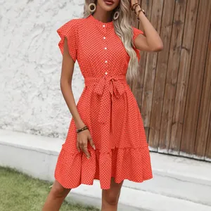 Stylish summer polka dot A-line dress featuring ruffle sleeves and a button-front tie waist