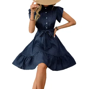 Chic navy blue polka dot A-line dress featuring ruffle sleeves and a waist tie for summer