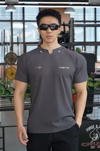 T-shirt de sport gris pour homme, coupe ajustée, tissu alvéolé respirant pour fitness