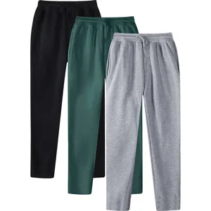 Detailed view of three pairs of men's casual joggers in black, dark green, and heather grey.