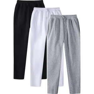 Set of three men's minimalist fleece-lined sweatpants in black, white, and grey colors.