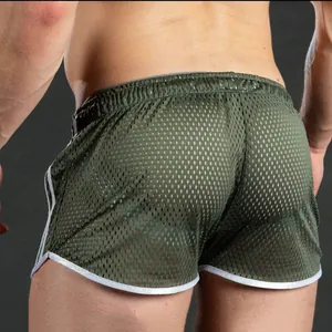 Back view detail of men's olive green breathable mesh shorts for gym and beach fitness.