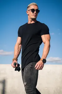 Athletic black short sleeve cotton t-shirt for men styled for a fitness lifestyle look