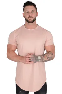 Detailed front view of men's light pink short sleeve T-shirt with curved hem on model