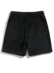 Detailed back view of men's oversized black coral fleece casual shorts for autumn winter
