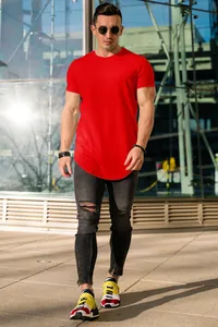 Vibrant red men's short sleeve T-shirt with curved hem for casual summer street style look.