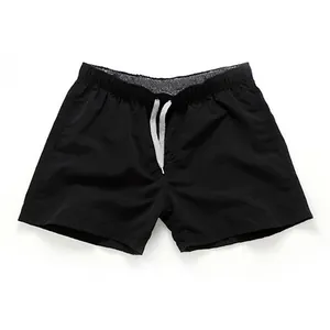 Short de plage classique noir pour hommes avec taille élastique et cordons de serrage blancs