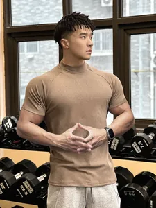 High-quality athletic muscle fit men's mock neck short sleeve gym t-shirt in brown