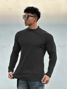 Slim fit men's thermal long sleeve athletic t-shirt highlighting muscle definition