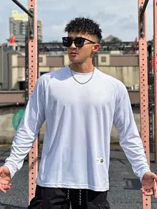 Detail view of men's white mesh long-sleeve sports T-shirt for fitness and outdoor training