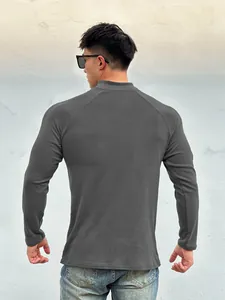Back view of a men's slim fit long-sleeve thermal T-shirt in dark gray