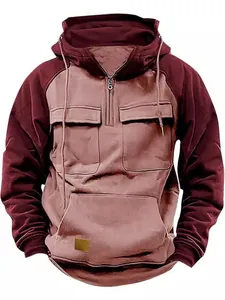 Close-up detail of a men's half-zip workwear hoodie with multiple utility pockets and hood
