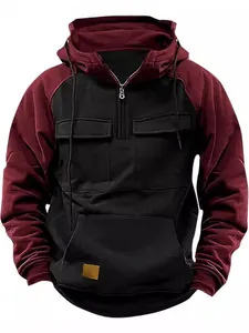 Detail of men's half-zip tactical hoodie with multi-pockets and color block design