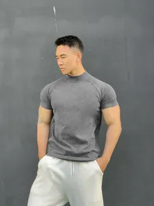 Athletic men's grey mock neck t-shirt with tight fit design for gym and casual wear