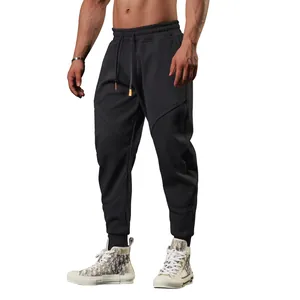 Men's warm fleece joggers with elastic waistband and panelled seams for winter outdoor sports