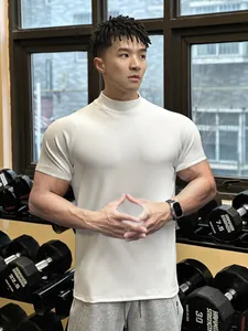 Men's athletic mock-neck short sleeve gym t-shirt in cream, tight muscle fit style.