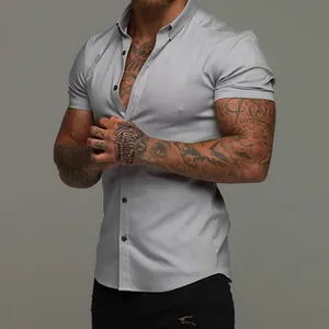 Close-up detail of a men's light grey stretch slim muscle fit short sleeve shirt