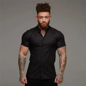 Black men's stretch muscle fit short sleeve shirt worn by a fitness model