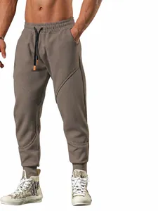 Men's warm fleece-lined jogger sweatpants in khaki for outdoor winter sports and running