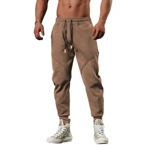 Men's brown loose joggers with 3D splicing detail for fitness and running training