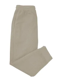 Dettaglio ravvicinato del motivo jacquard sabbia sui pantaloni casual sportivi da uomo