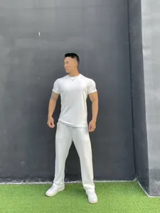 Full body view of athletic man wearing a white slim fit cotton sports t-shirt