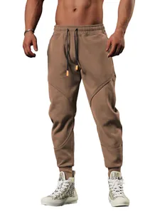 Men's loose sports joggers with 3D panel stitching and cuffed ankles in earthy brown