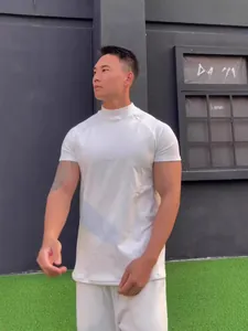Athletic men's mock neck short sleeve white t-shirt and shorts set for fitness and casual wear