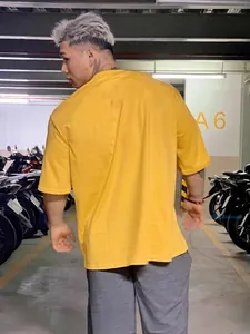 Camiseta de fitness de algodón amarillo brillante oversize para hombre estilo urbano